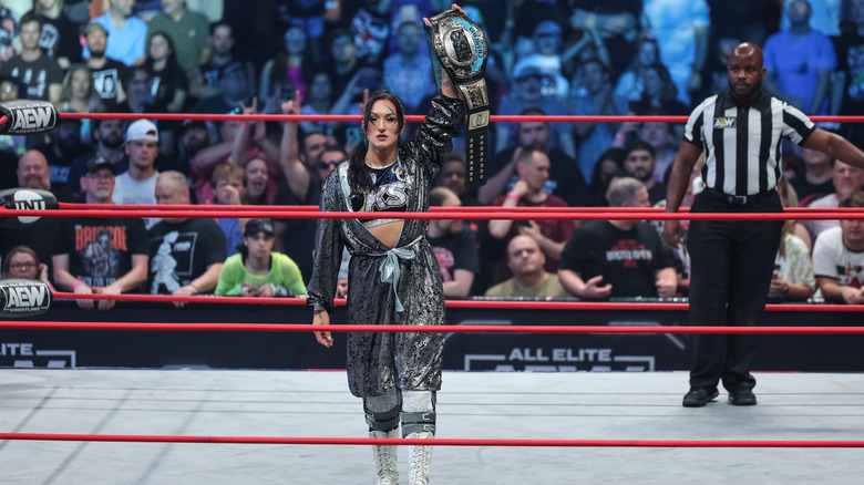 Kris Statlander holds her title high