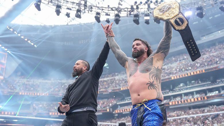 Jey Uso celebrates with Jimmy Uso at WrestleMania 41