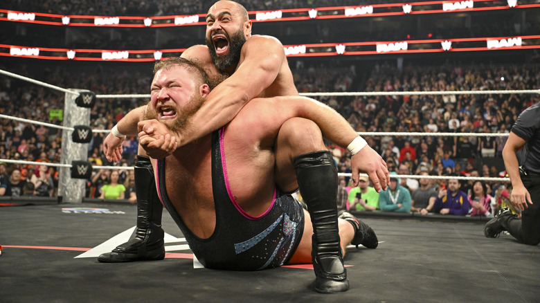 Rusev puts Otis in the Accolade after returning to "WWE Raw"