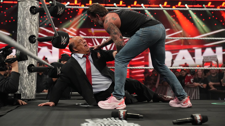 CM Punk checks on Paul Heyman in the corner on "WWE Raw"