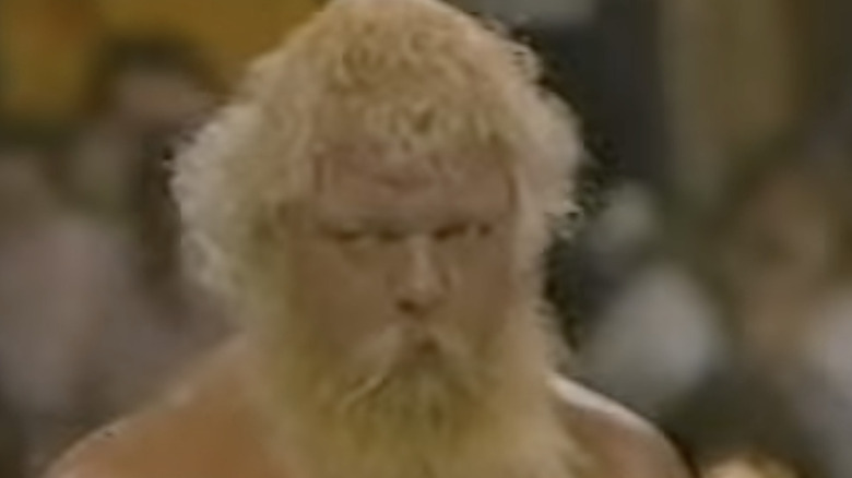 Larry Latham scowls