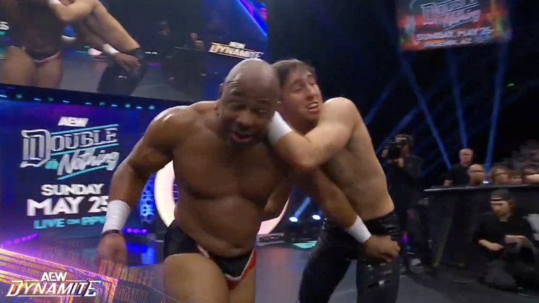 Lethal and Wayne on the outside of the ring