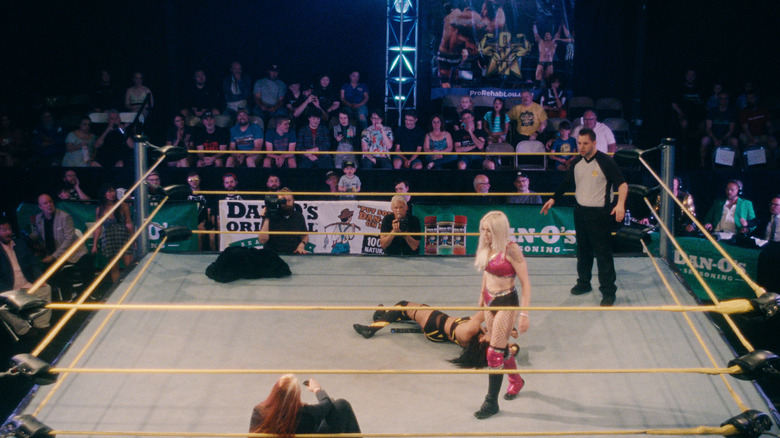 Outdoor wrestling ring crowd
