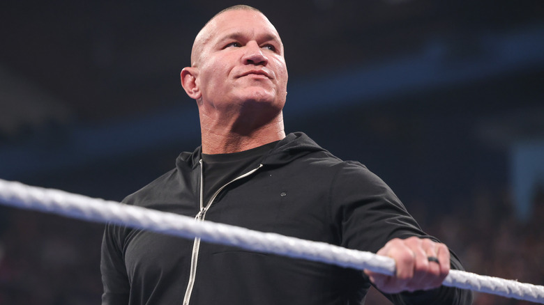 Randy Orton with his hand on the ropes on "WWE SmackDown"