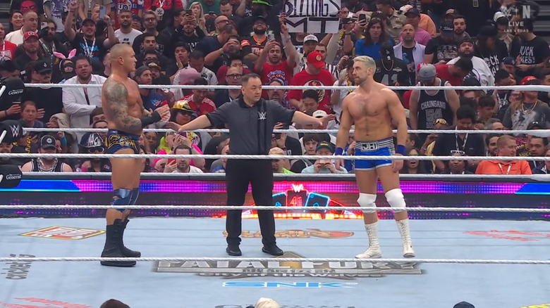 Orton and Hendry staring each other down in the ring