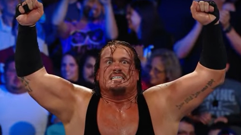Rhyno raising his arms