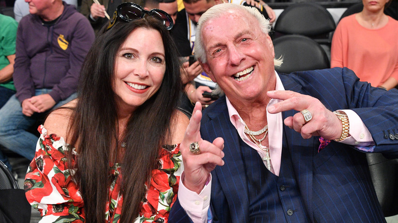 Ric Flair and Wendy Barlow attend a basketball game between the Los Angeles Lakers and the New Orleans Pelicans at Staples Center on February 25, 2020 in Los Angeles, California.