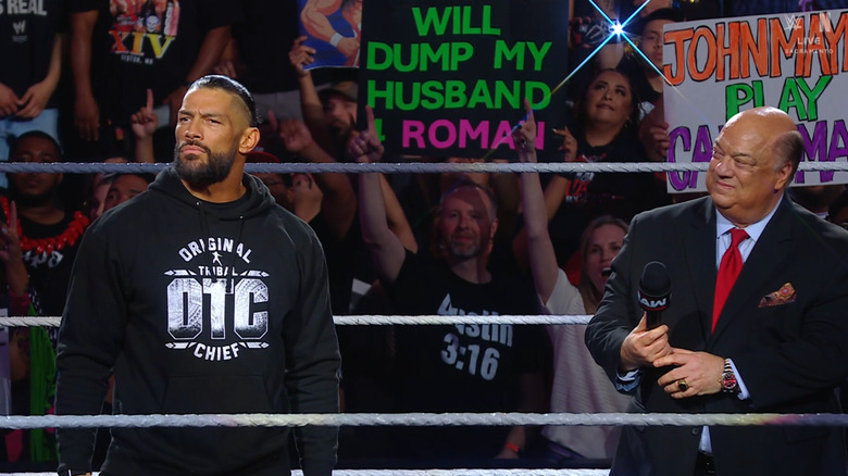Reigns and Heyman in the ring