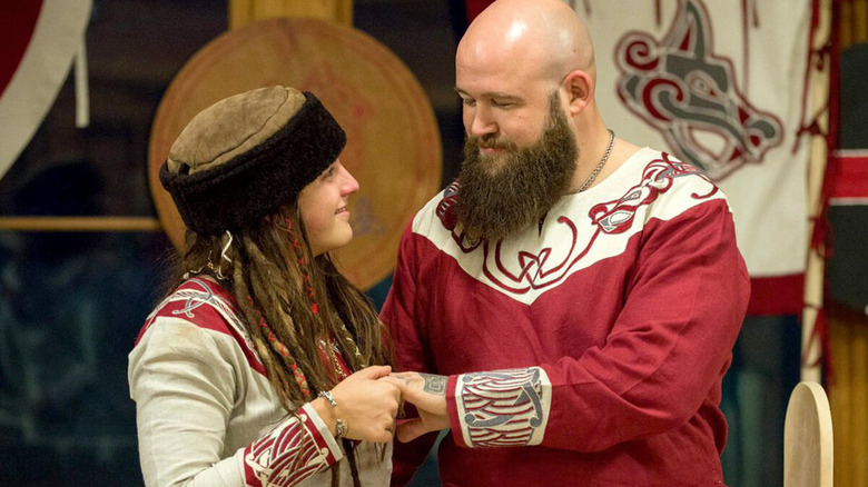 Sarah Logan and Erik Rowe pose in Viking-themed garb in a photo posted to WWE.com.