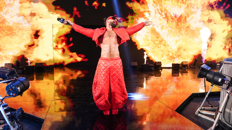 Seth Rollins posing with a microphone