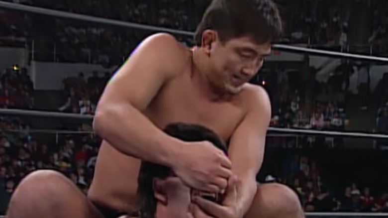 Shinjiro Otani grabs opponent