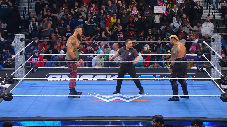 Strowman and Sikoa staring one another down