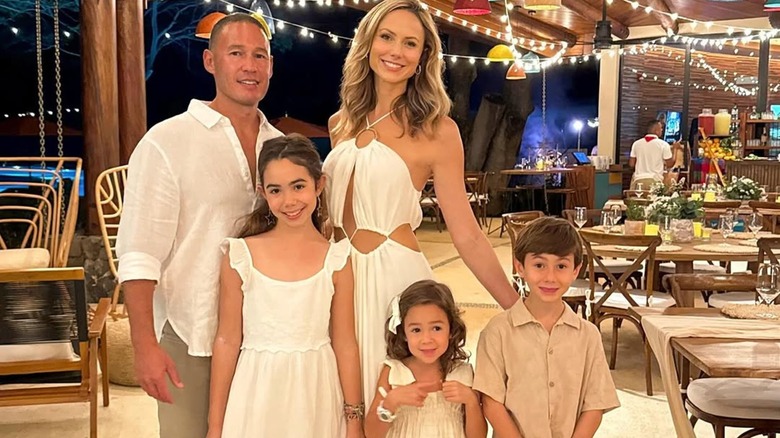 Stacy Kiebler, her husband, Jared Pobre, and their three children.
