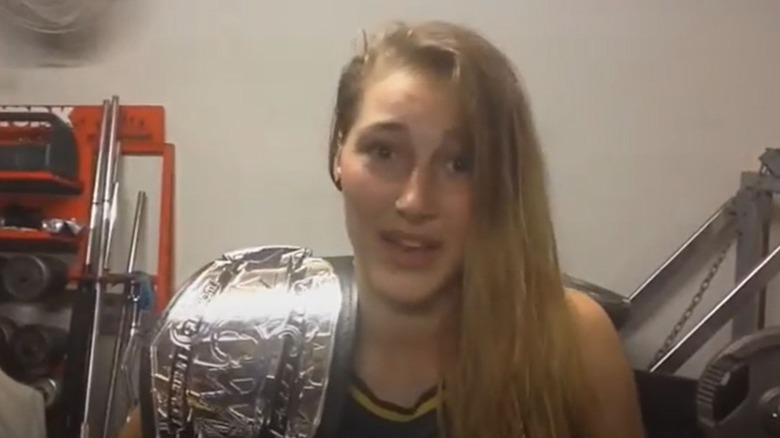 Demi Bennett sits in front of the camera during an interview after winning the RCW Women's Championship.