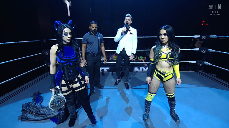 Vaquer and Perez staring each other down in the ring