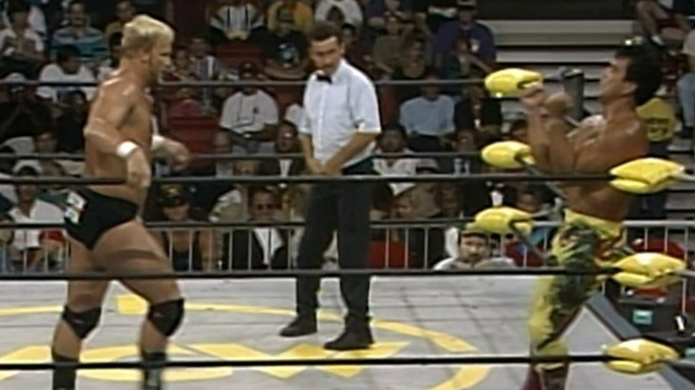 Steve Austin walking toward Ricky Steamboat