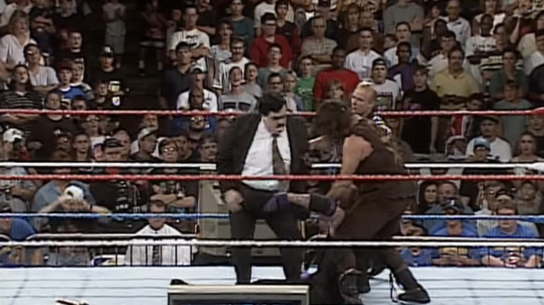 paul bearer and mick foley attack undertaker