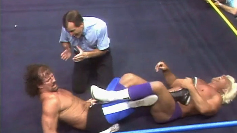 Terry Funk in Ric Flair's figure 4