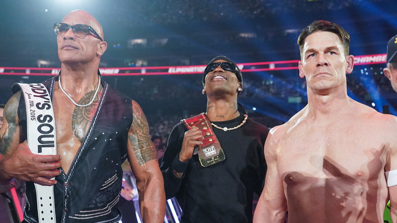 The Rock, Travis Scott, and John Cena at WWE Elimination Chamber