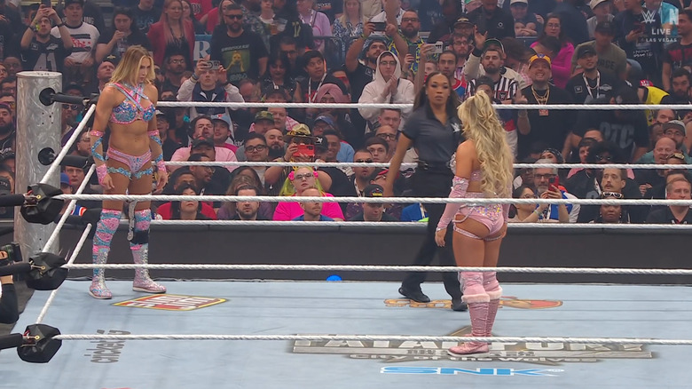 Flair and Stratton staring each other down in the ring