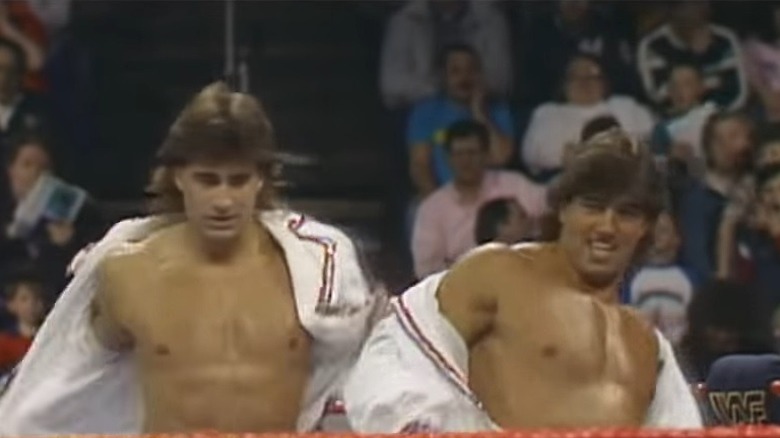 Tom Zenk and Rick Martel take off jackets