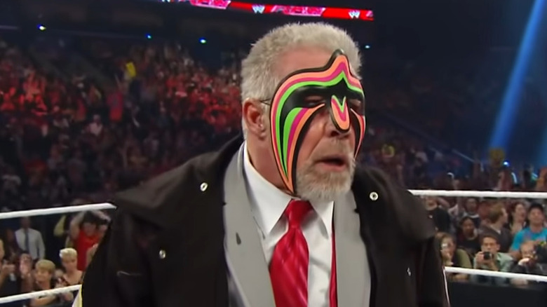 Ultimate Warrior wears mask