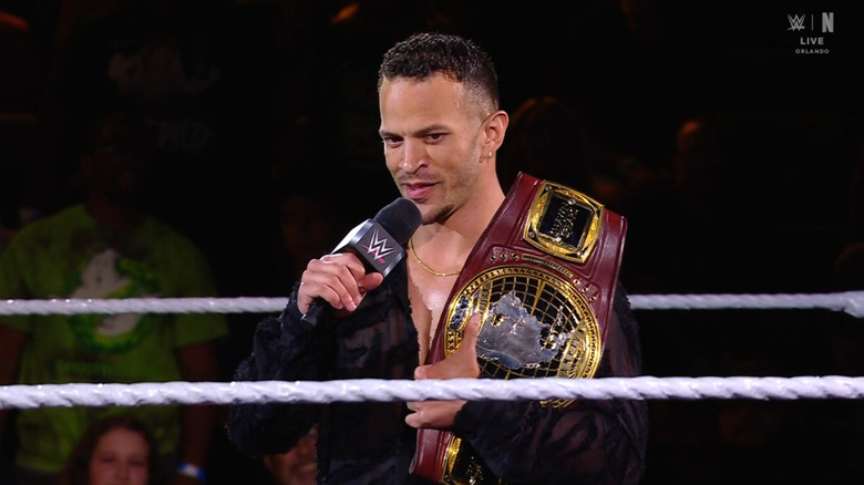 Saints with his North American Championship in the ring