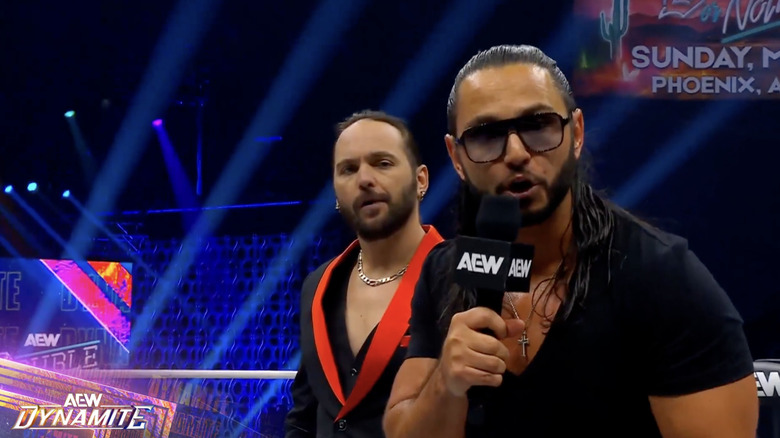 Matthew and Nicholas speaking in the ring