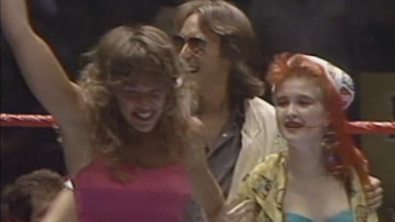 Wendi Richter, David Wolff, and Cyndi Lauper celebrate
