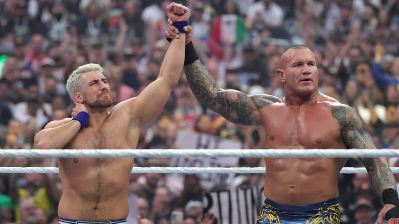Randy Orton raises Joe Hendry's hand